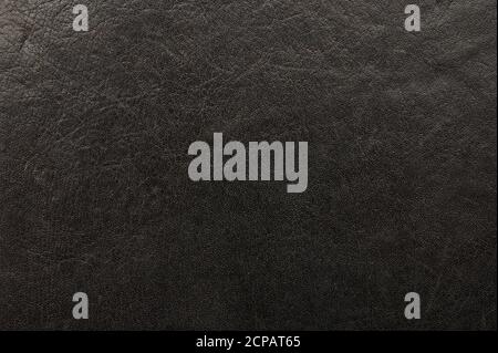 Smooth black leather texture surface background close up view Stock Photo