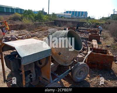 DISTRICT KATNI, INDIA - DECEMBER 13, 2019: Automatic Cement mixer equipment presented at indian construction site. Stock Photo