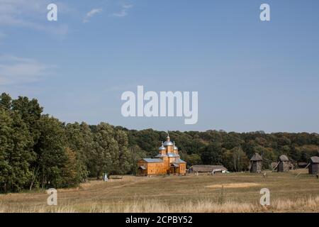 an old wooden church in the forest Stock Photo