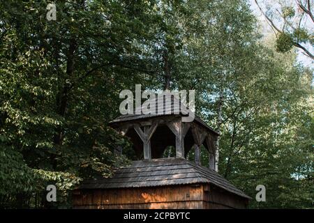 an old wooden church in the forest Stock Photo