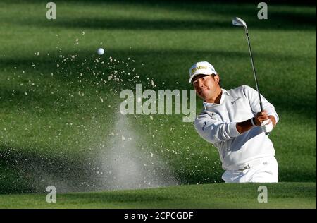 Hideki Matsuyama of Japan hits from a bunker on the 16th hole in second round play during the 2017 Masters golf tournament at Augusta National Golf Club in Augusta, Georgia, U.S., April 7, 2017. REUTERS/Mike Segar