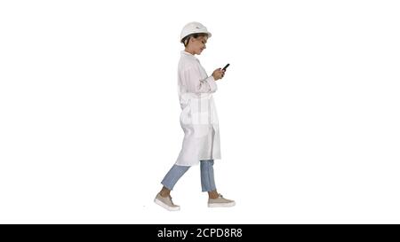 Female Scientist Using Smartphone Walking on white background. Stock Photo