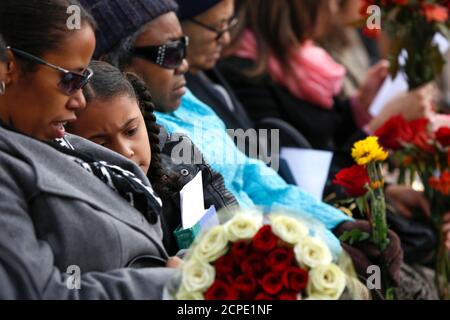 Friends and family members attend the 13th anniversary memorial service for the Flight 587 crash in the Queens borough of New York November 12, 2014. On November 12, 2001, the American Airlines flight crashed into the Belle Harbor neighborhood of Queens shortly after takeoff killing all 260 people on board the flight and five people on the ground.  REUTERS/Shannon Stapleton (UNITED STATES - Tags: DISASTER TRANSPORT ANNIVERSARY)