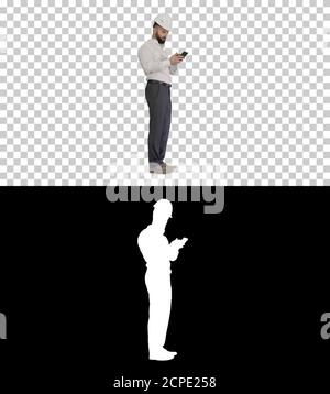 Smart engineer in white shirt and safety engineering hat using s Stock Photo