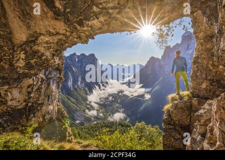 Italy, Veneto, Belluno, Agordino. Lookout from the legendary San Lucano cave on the valley, Pale dei Balconi, Dolomites Stock Photo