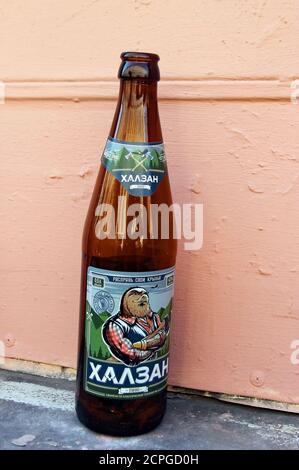 Empty beer bottle in a side street, St Petersburg. Russia. Stock Photo