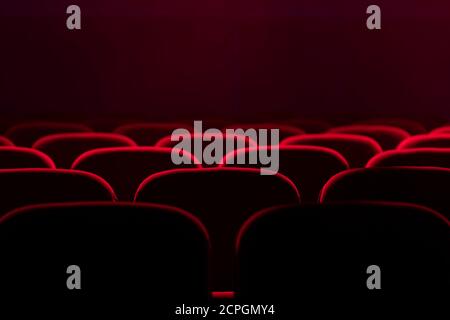 Empty cinema hall with red seats. Movie theatre Stock Photo