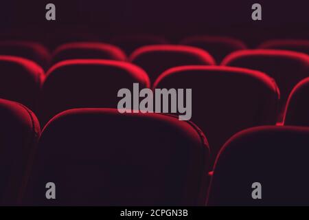 Empty cinema hall with red seats. Movie theatre Stock Photo