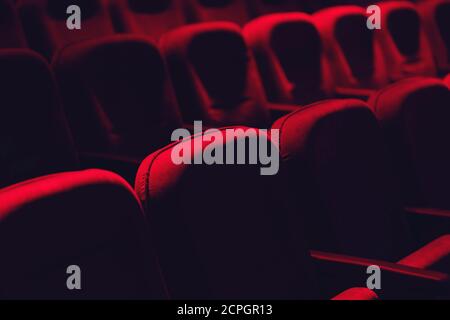Empty cinema hall with red seats. Movie theatre Stock Photo