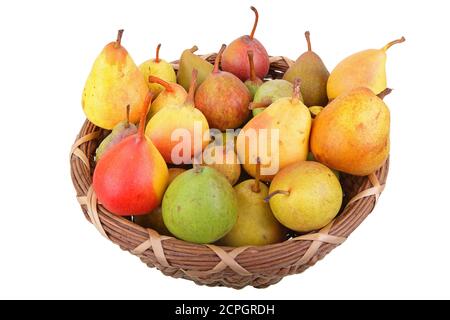 Different varieties of pears in a wicker basket, cut-out, Germany, Europe Stock Photo