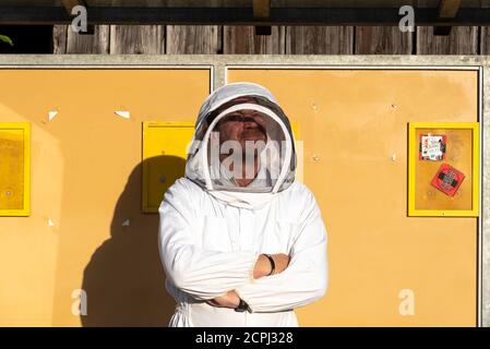 Beekeeper is waiting for the bus Stock Photo