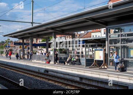 Germany, Bavaria, Erlangen, central station, railway tracks, platforms, passengers, travelers. Stock Photo