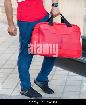 Red luxury sportsman duffel bag close up Stock Photo