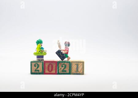 lego joker and robin celebrating year 2021. Lego minifigures are manufactured by The Lego Group. Stock Photo