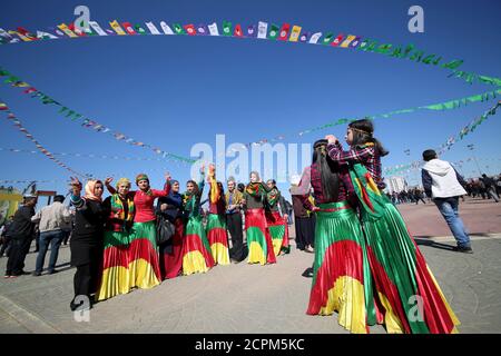 Kurdish women dance during the Newroz festival in Istanbul. Newroz ...