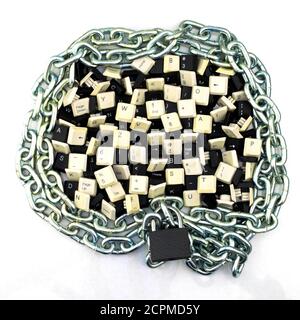 censorship, restrictions and restrictions on the Internet. concept, keys from computer keyboards in a chained space and under lock and key Stock Photo