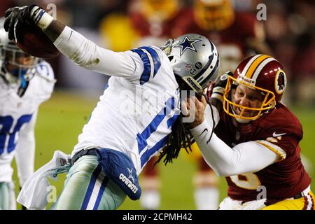 Washington Redskins punter Sav Rocca (R 