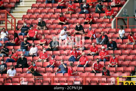 Charlton Athletic fans inside the stands where up to 1000 spectators are expected to attend the Sky Bet League One match at The Valley, London. Stock Photo