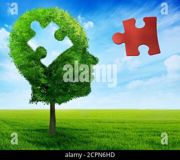 Puzzle head brain mental health symbol concept. Tree in a shape of human head face profile with jigsaw piece cut out on blue sky background. Stock Photo