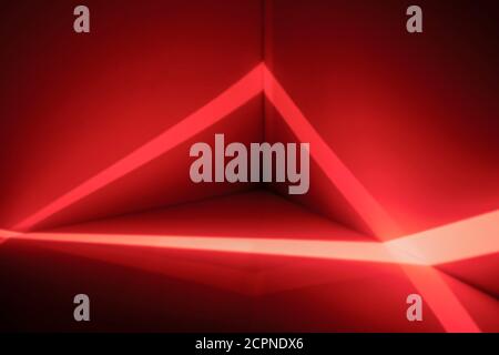 red background with lines and vignette, three-dimensional, suitable for product presentation Stock Photo