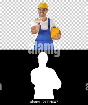 Worker holding paint brush smiling to camera, Alpha Channel Stock Photo