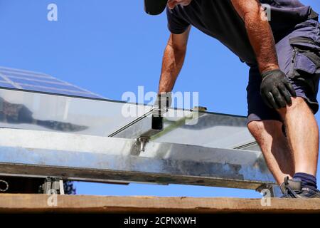 Installation of a glass roof for the terrace Stock Photo