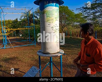 DISTRICT KATNI, INDIA - JANUARY 23, 2020: iron material made world time science model presentation on garden area, education program by Asian countrie Stock Photo