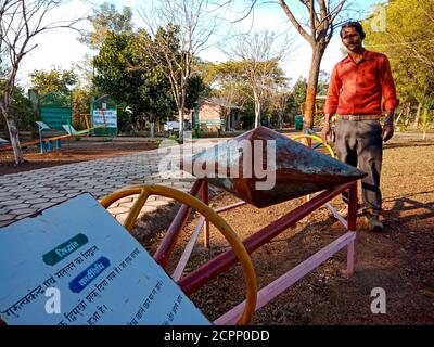 DISTRICT KATNI, INDIA - JANUARY 23, 2020: iron material made Double ended cone science model presentation on garden area, education program by Asian c Stock Photo