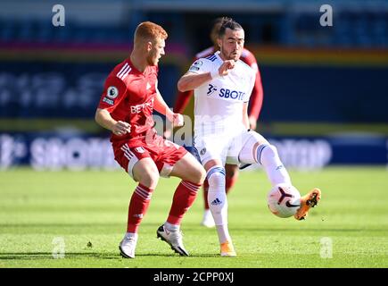 Fulham's Harrison Reed and Leeds United's Jack Harrison (right) battle for the ball during the Premier League match at Elland Road, Leeds. Stock Photo