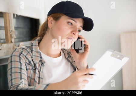 female researcher technician on the phone Stock Photo