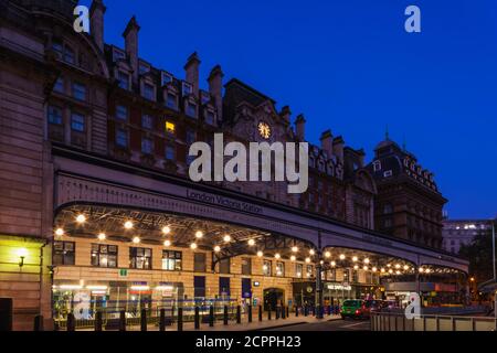 England, London, Westminster, Victoria Train Station at Night Stock Photo