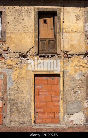 Germany, Saxony-Anhalt, Hamersleben, bricked up door, old window, ruin Stock Photo