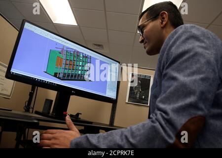 Product Development Engineer Jigar Patel works with a CAD image of a thrust reverser cascade in development at Oxford Performance Materials Inc., the maker of more than 600 parts to be used on Boeing's new Starliner manned spacecraft, in South Windsor, Connecticut, the maker of more than 600 parts to be used on Boeing's new Starliner manned spacecraft, in South Windsor, Connecticut, U.S., January 31, 2017. Picture taken January 31,2017. REUTERS/Mike Segar