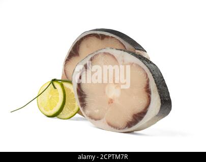 Slices of blue shark, tintorera in Spanish, isolated on white. The meat of the blue shark is edible. It is sold fresh, dried, salted, or smoked. Stock Photo