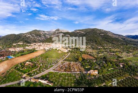Caimari, plantations with blooming almond trees and olive trees, Raiguer region, Serra de Tramuntana, aerial view, Mallorca, Balearic Islands, Spain Stock Photo