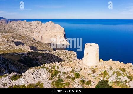 Watchtower Talaia díAlbercutx, behind it Mirador Es Colomer and Punta de la Salada, Formentor peninsula, near PollenÁa, drone image, Mallorca, Baleari Stock Photo