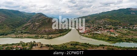 Panorama of confluence of the two rivers, Mtkvari and Aragvi and historical center of Mtskheta town in Georgia Stock Photo