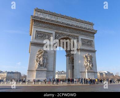 The Arc de Triomphe on December in Paris, France. The Arc de Triomphe honours those who fought and died for France in the French wars. Stock Photo