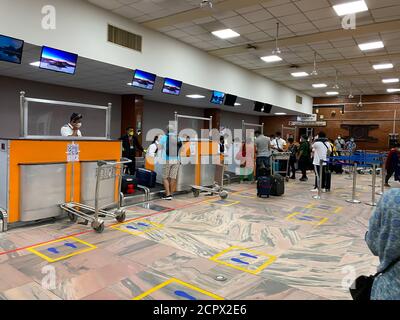 Kathmandu,Nepal July-18,2020 Inside Airport terminal ,Passenger are maintaining social distancing with protective face mask due to Pandemic  covid-19, Stock Photo