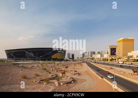 Las Vegas, SEP 15, 2020 - Afternoon sunny view of the Statue of Liberty  wear Raiders football shirt and face mask Stock Photo - Alamy