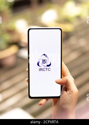 Assam, india - September 12, 2020 : Irctc logo on phone screen stock image. Stock Photo