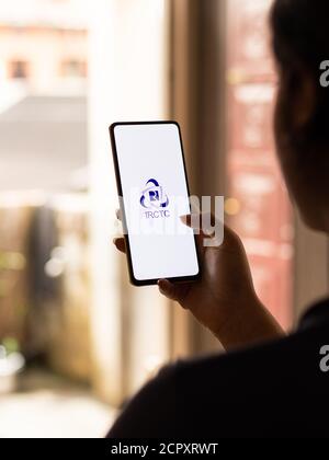 Assam, india - September 12, 2020 : Irctc logo on phone screen stock image. Stock Photo