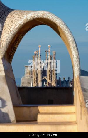 Barcelona, Casa Milá, La Pedrera, Antoni Gaudi, architectural monument, view from the roof terrace to the Sagrada Familia (construction cranes Stock Photo