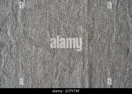 Natural linen texture background. Crumpled fabric of gray color, rough texture, copy space Stock Photo