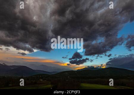 Storm clouds open at sunset after the storm. Abruzzo, Italy, Europe Stock Photo