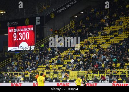 Dortmund, Germany. 19th Sep, 2020. Football: Bundesliga, Borussia Dortmund - Borussia Mönchengladbach, 1st matchday at Signal Iduna Park. The number of spectators of 9,300 is shown on the scoreboard. IMPORTANT NOTICE: In accordance with the regulations of the DFL Deutsche Fußball Liga and the DFB Deutscher Fußball-Bund, it is prohibited to use or have used in the stadium and/or from the game taken photographs in the form of sequence images and/or video-like photo series. Credit: Bernd Thissen/dpa/Alamy Live News Stock Photo