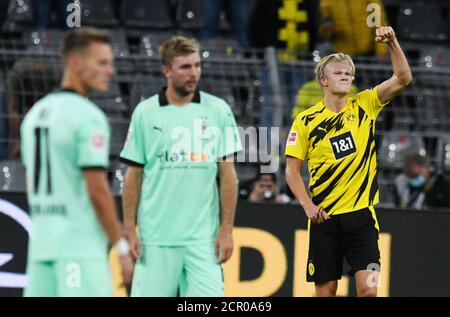Dortmund, Germany. 19th Sep, 2020. Football: Bundesliga, Borussia Dortmund - Borussia Mönchengladbach, 1st matchday at Signal Iduna Park. Dortmund's Erling Haaland celebrates its goal of 2:0. IMPORTANT NOTE: According to the regulations of the DFL Deutsche Fußball Liga and the DFB Deutscher Fußball-Bund, it is prohibited to use or have used in the stadium and/or photographs taken of the match in the form of sequence images and/or video-like photo series. Credit: Bernd Thissen/dpa/Alamy Live News Stock Photo