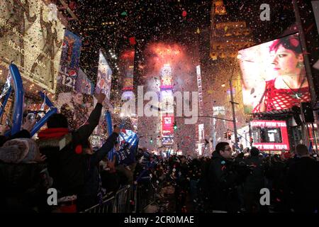 Confetti rains down on Times Square at the stroke of midnight during the New Year&#039;s Eve