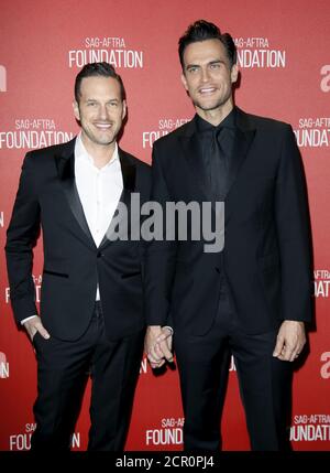 Cheyenne Jackson and husband Jason Landau attending The People v. O.J ...