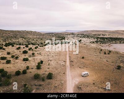 Aerial view of a US desert with motorhome Stock Photo